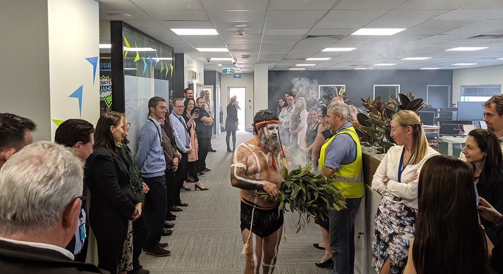 The Newcastle team attends the Worimi cleansing the new office refurbishment at Newcastle Airport, Williamtown NSW